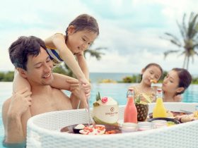 family in the pool with floating breakfast